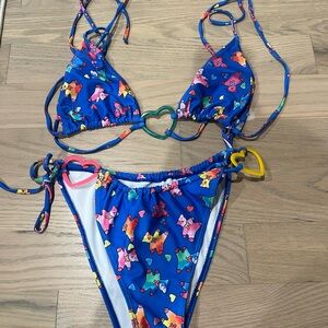 Super cute and trendy strappy colorful swimsuit.